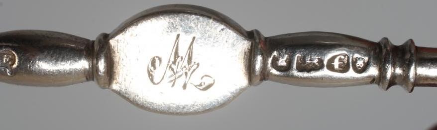 A PAIR OF GEORGE IV SILVER KNIFE RESTS by Emes & Barnard, London 1821, with escallop shell end Image