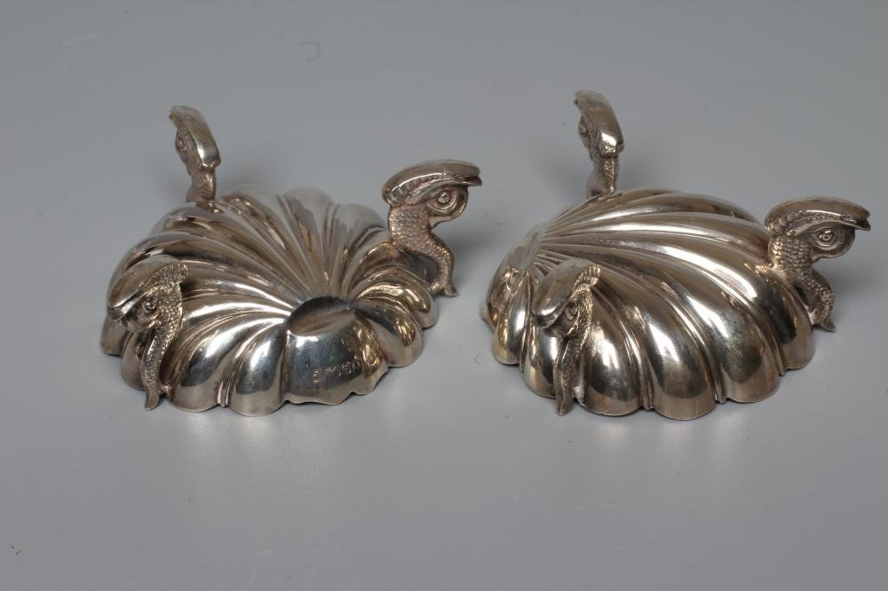 A PAIR OF VICTORIAN SILVER SHELL SALTS by Henry Hall & John Edward Bingham, Sheffield 1868, raised Image
