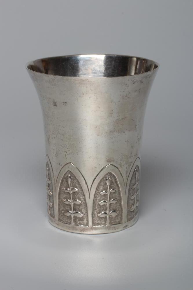 AN AUSTRIAN SILVER BEAKER, early 19th century, of flared cylindrical form, the lower section chased Image