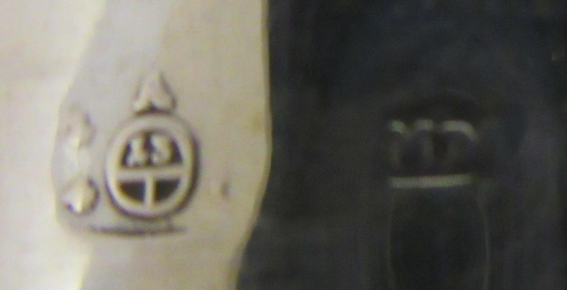 AN AUSTRIAN SILVER BEAKER, early 19th century, of flared cylindrical form, the lower section chased Image