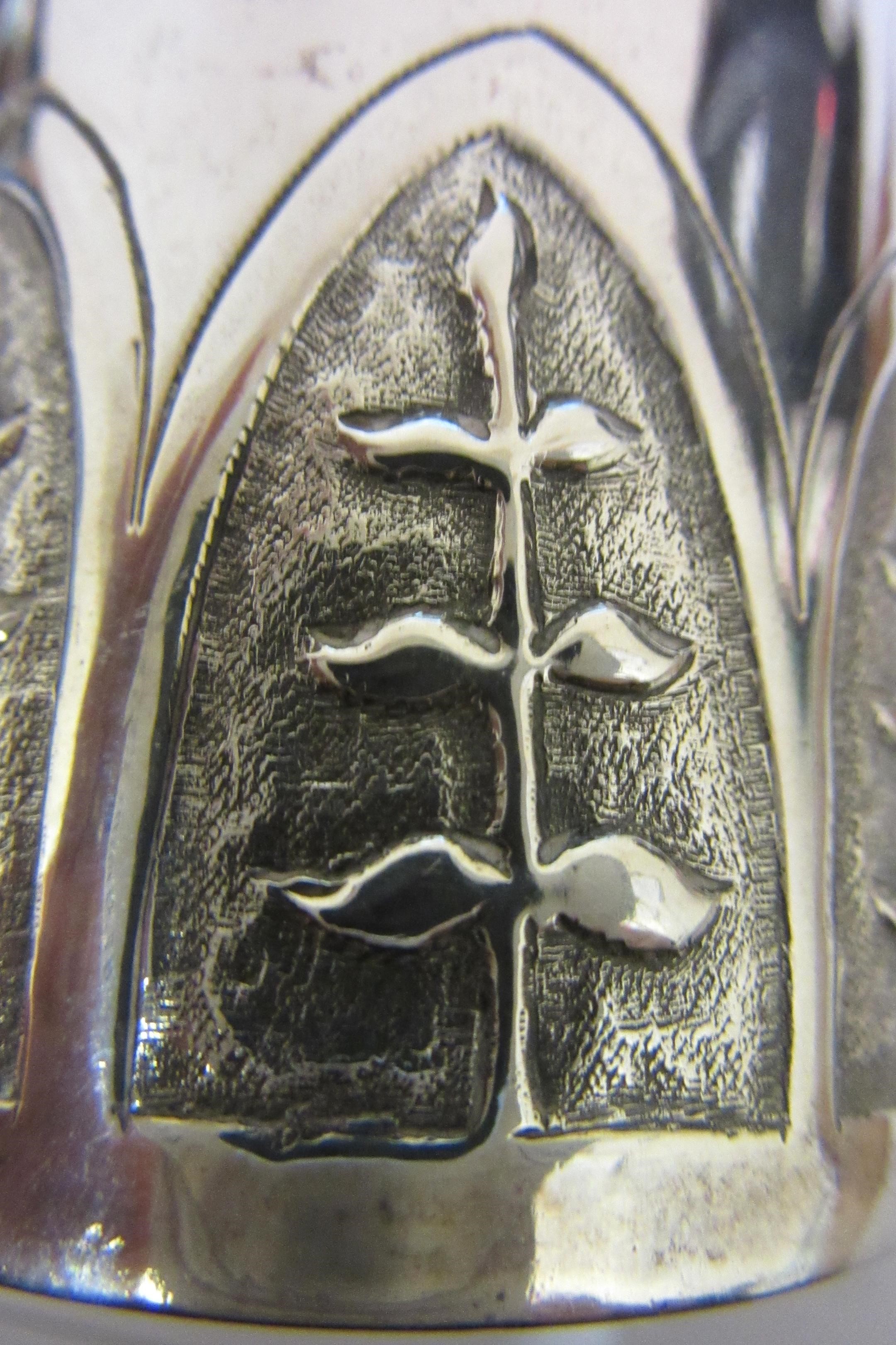 AN AUSTRIAN SILVER BEAKER, early 19th century, of flared cylindrical form, the lower section chased Image