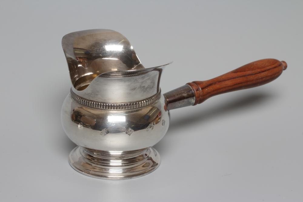 AN ELIZABETH II SILVER BRANDY WARMER by Mappin & Webb Image