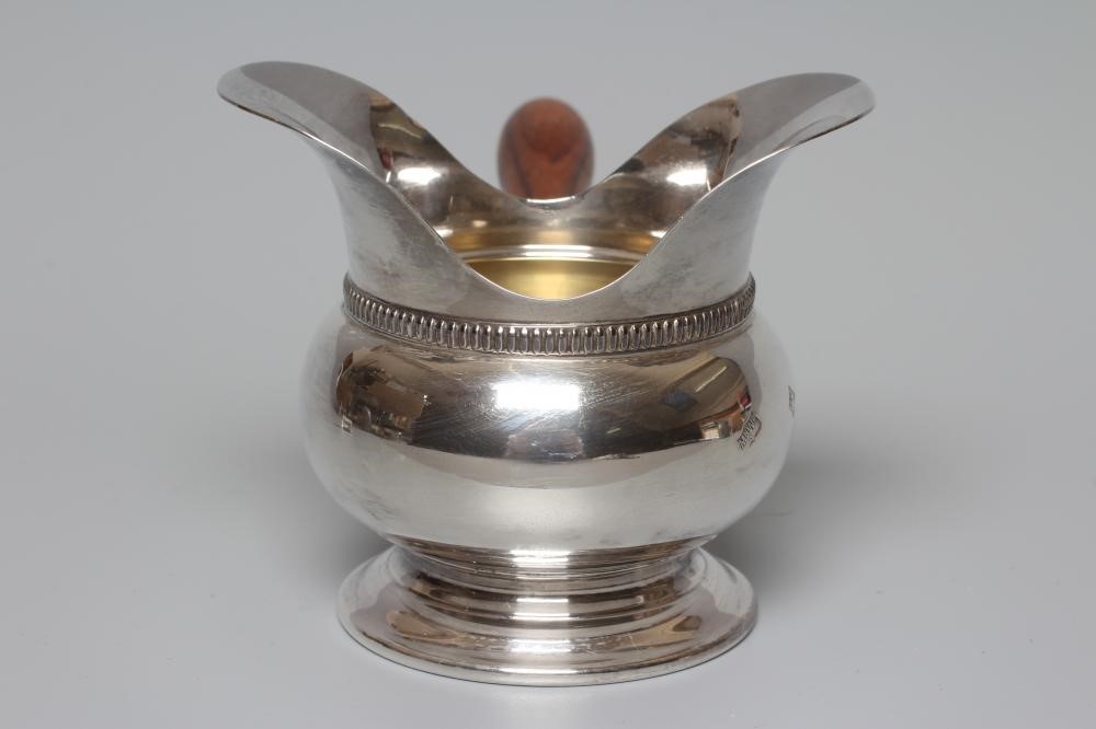 AN ELIZABETH II SILVER BRANDY WARMER by Mappin & Webb Image