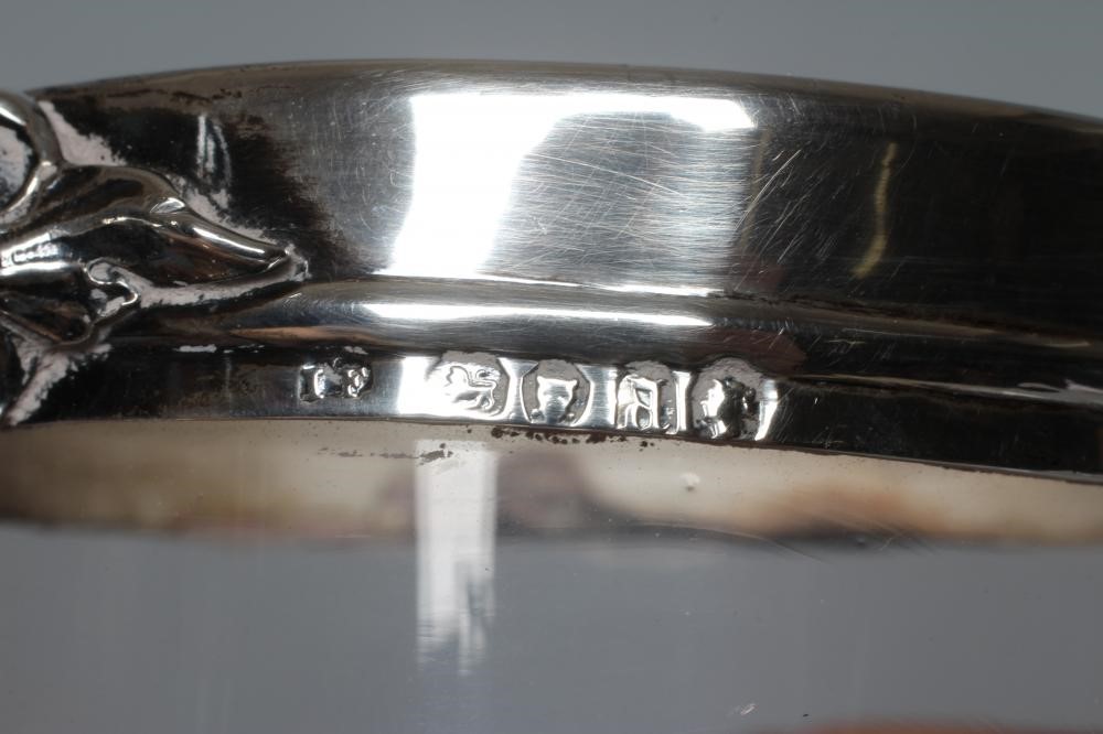 AN EARLY VICTORIAN SILVER MUG by John Wilmin Figg, London 1856, the clear glass cylindrical body Image