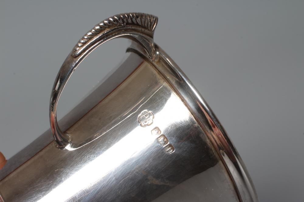 AN ELIZABETH II SILVER CHRISTENING CUP by Pinder Bros., Sheffield 1971, of flared cylindrical form Image
