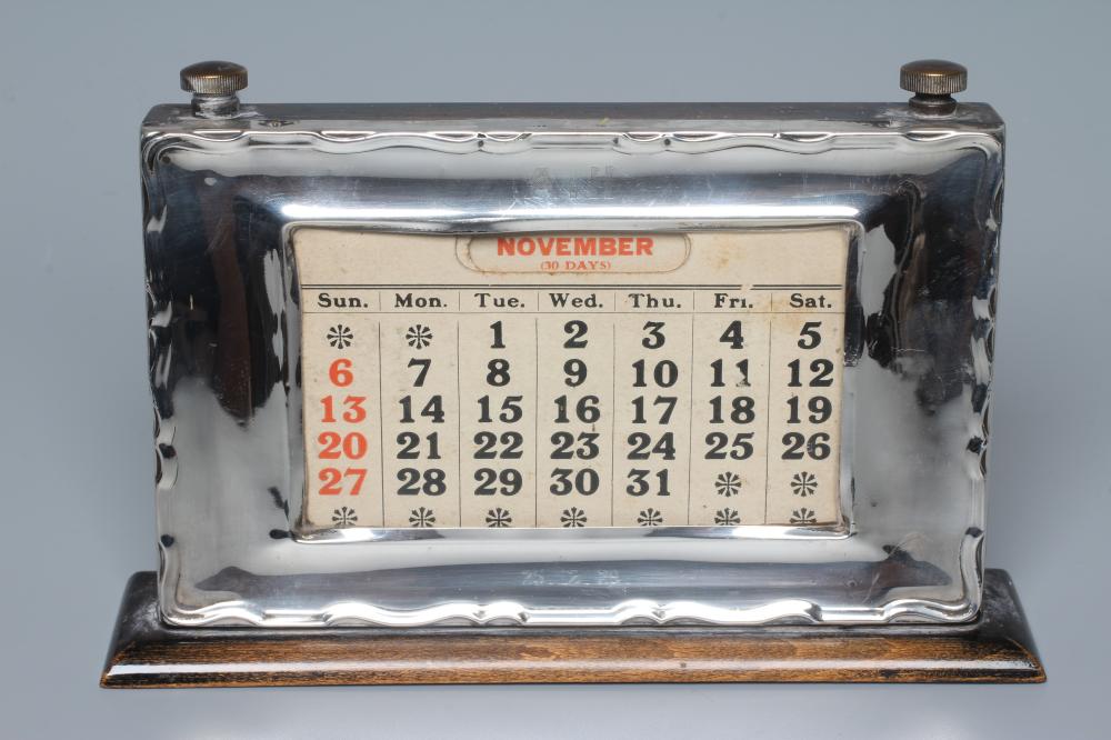 A GEORGE V SILVER PERPETUAL DESK CALENDAR by W J Myatt & Co. Image
