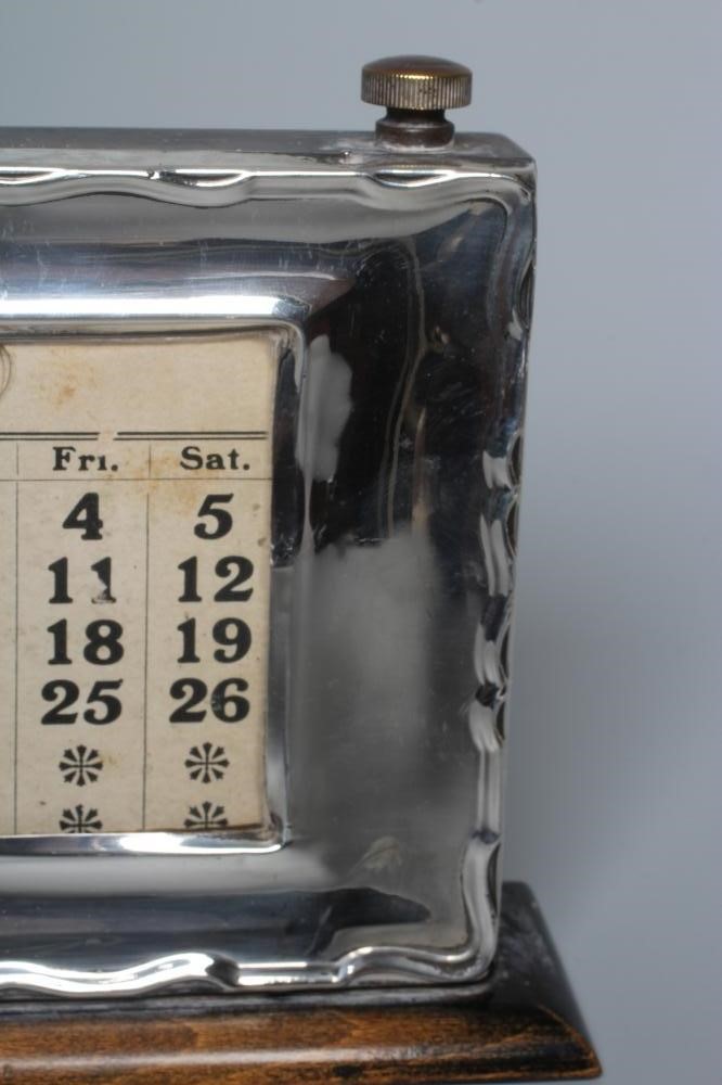 A GEORGE V SILVER PERPETUAL DESK CALENDAR by W J Myatt & Co. Image