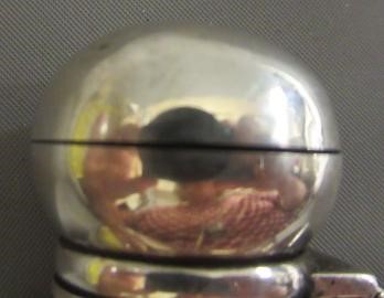 A VICTORIAN SILVER HIP FLASK by George Unite, London 1869, of flattened oval section with hinged Image