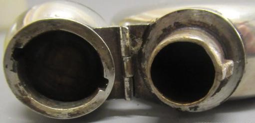 A VICTORIAN SILVER HIP FLASK by George Unite, London 1869, of flattened oval section with hinged Image