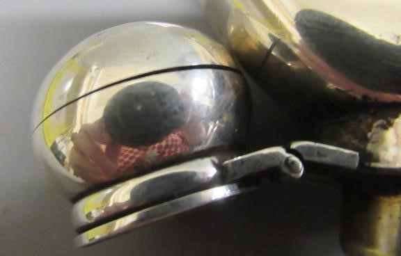 A VICTORIAN SILVER HIP FLASK by George Unite, London 1869, of flattened oval section with hinged Image