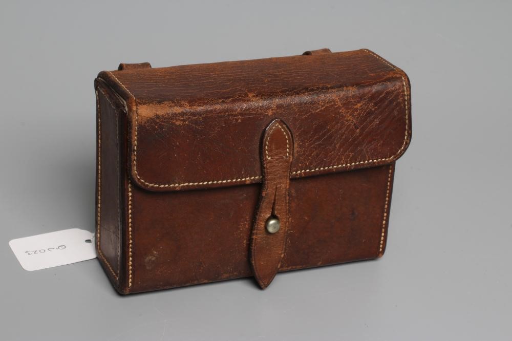 AN EPNS SANDWICH BOX retailed by Swaine & Adenley, of plain oblong form with belt loop, in original Image