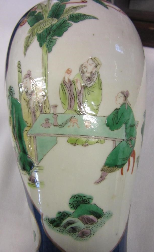 A CHINESE PORCELAIN FAMILLE VERTE VASE of inverted baluster form painted with lobed panels of Image