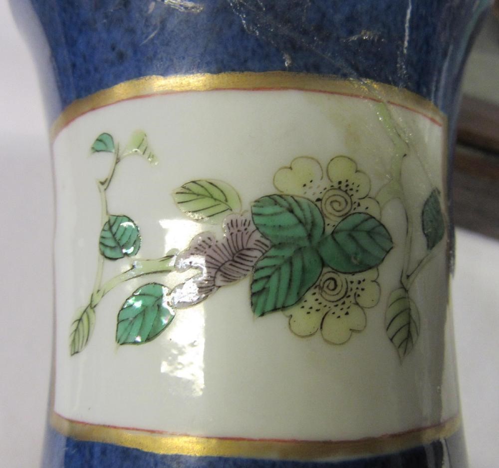 A CHINESE PORCELAIN FAMILLE VERTE VASE of inverted baluster form painted with lobed panels of Image