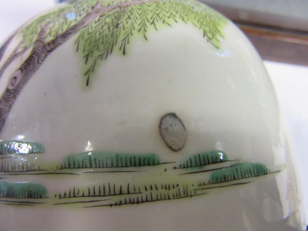 A CHINESE PORCELAIN FAMILLE VERTE VASE of inverted baluster form painted with lobed panels of Image