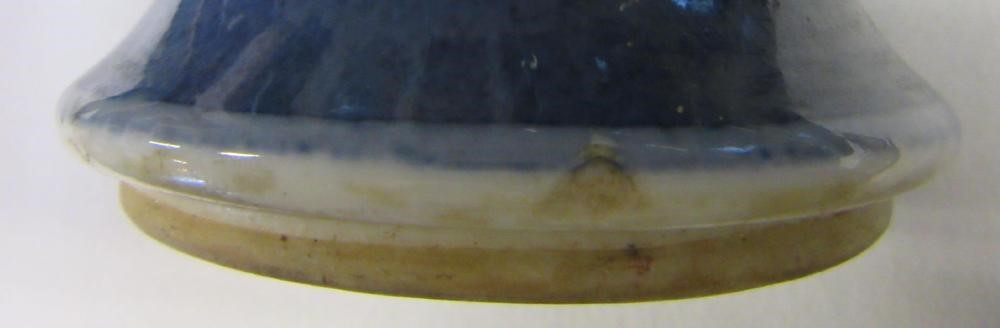 A CHINESE PORCELAIN FAMILLE VERTE VASE of inverted baluster form painted with lobed panels of Image