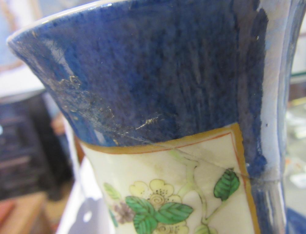 A CHINESE PORCELAIN FAMILLE VERTE VASE of inverted baluster form painted with lobed panels of Image