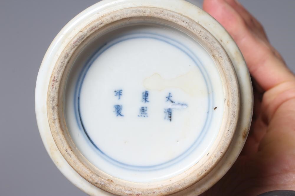 A CHINESE PORCELAIN FAMILLE VERTE VASE of inverted baluster form painted with lobed panels of Image