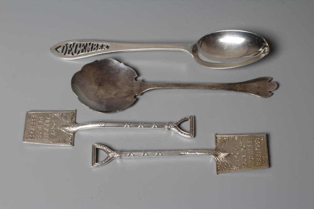 AN EDWARDIAN SILVER ARTS AND CRAFTS PRESERVE SPOON by C W Fletcher & Son Ltd. Image