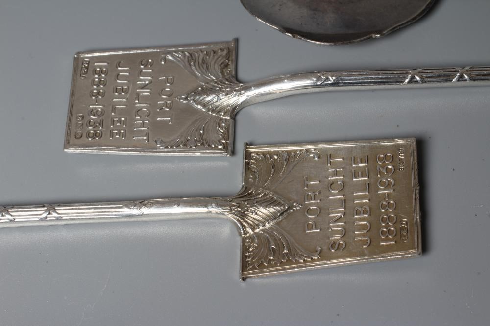 AN EDWARDIAN SILVER ARTS AND CRAFTS PRESERVE SPOON by C W Fletcher & Son Ltd. Image