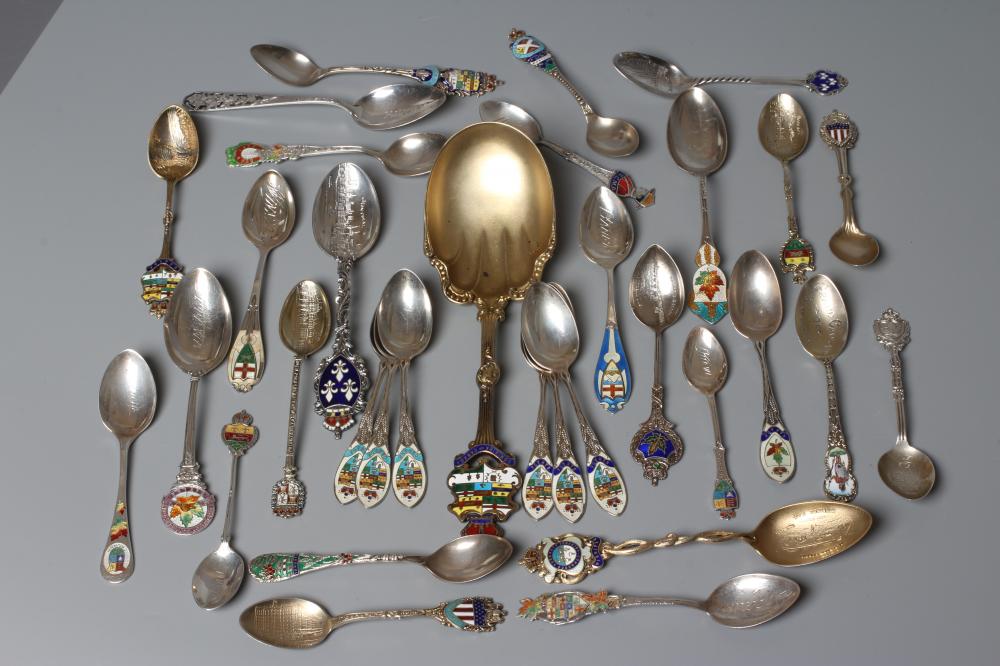 A COLLECTION OF CANADIAN SILVER AND ENAMEL SOUVENIR SPOONS including a set of six teaspoons and a Image