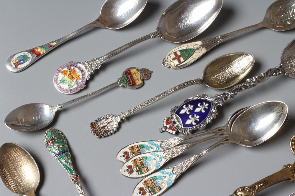 A COLLECTION OF CANADIAN SILVER AND ENAMEL SOUVENIR SPOONS including a set of six teaspoons and a Image