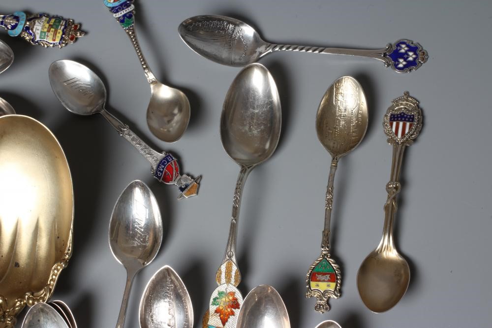 A COLLECTION OF CANADIAN SILVER AND ENAMEL SOUVENIR SPOONS including a set of six teaspoons and a Image