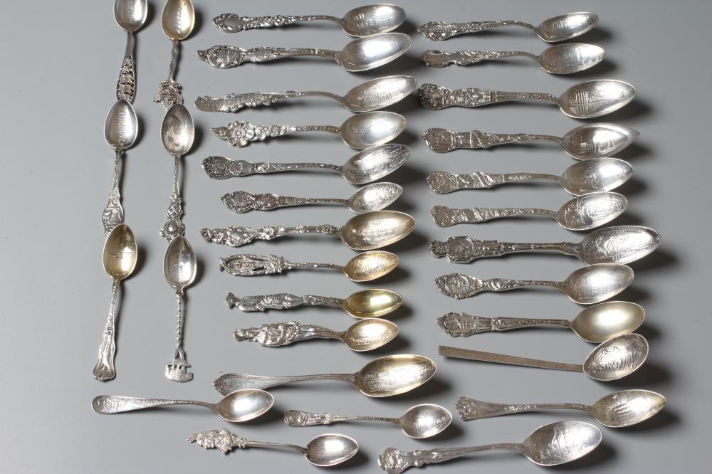 THIRTY TWO NORTH AMERICAN SILVER SOUVENIR TEASPOONS mainly stamped Sterling (certainly all silver) Image