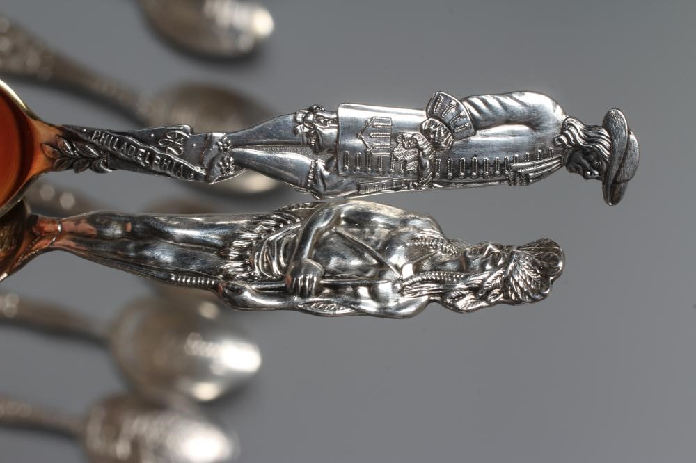 THIRTY TWO NORTH AMERICAN SILVER SOUVENIR TEASPOONS mainly stamped Sterling (certainly all silver) Image