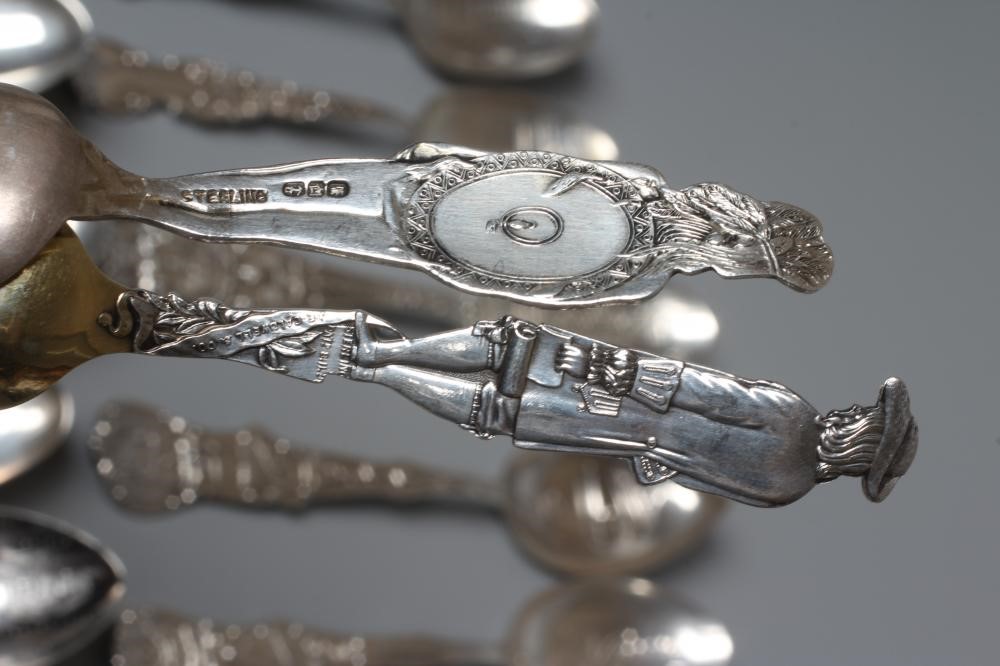THIRTY TWO NORTH AMERICAN SILVER SOUVENIR TEASPOONS mainly stamped Sterling (certainly all silver) Image