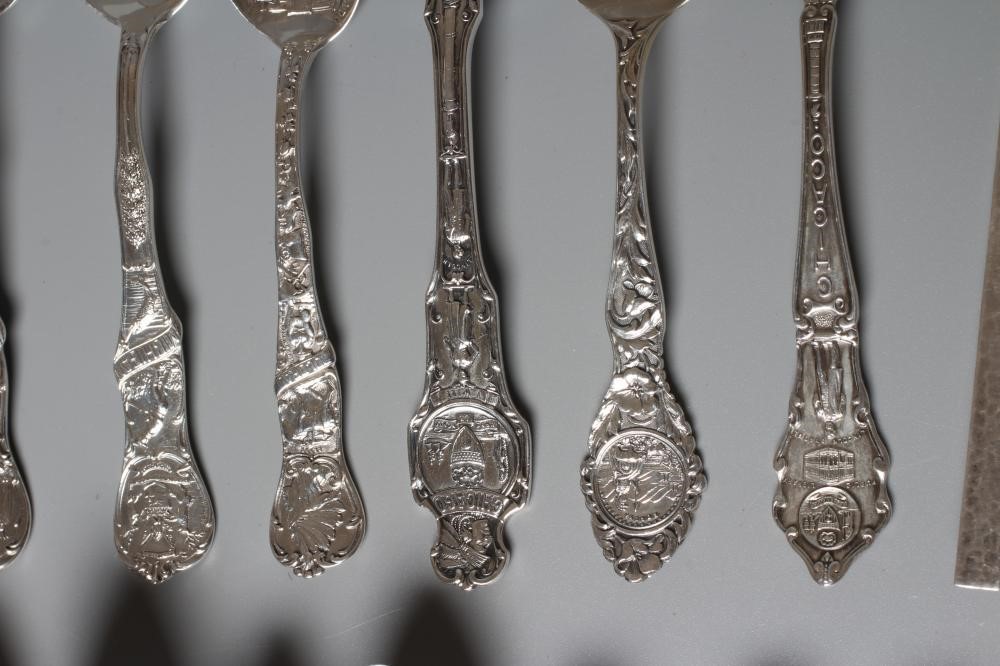 THIRTY TWO NORTH AMERICAN SILVER SOUVENIR TEASPOONS mainly stamped Sterling (certainly all silver) Image