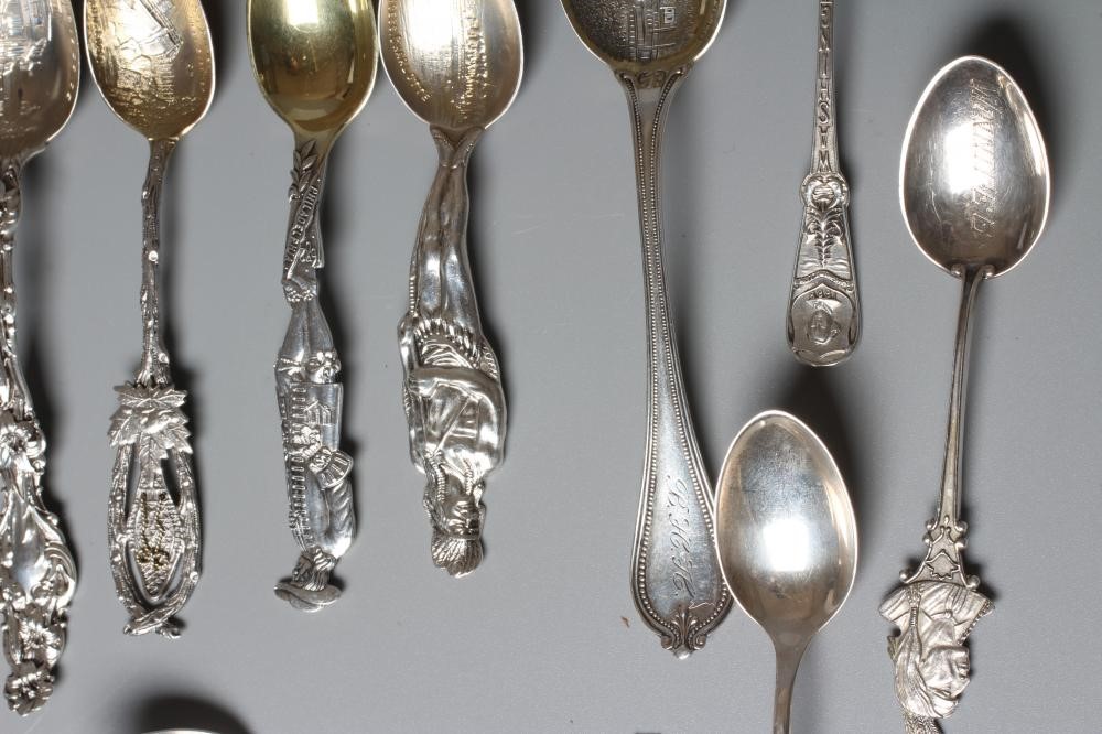 THIRTY TWO NORTH AMERICAN SILVER SOUVENIR TEASPOONS mainly stamped Sterling (certainly all silver) Image
