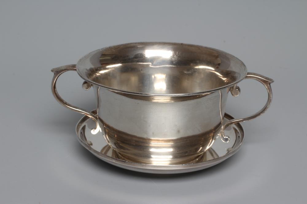 A LATE VICTORIAN SILVER TWO HANDLED PORRINGER AND STAND by Holland, Aldwinckle & Slater, London Image