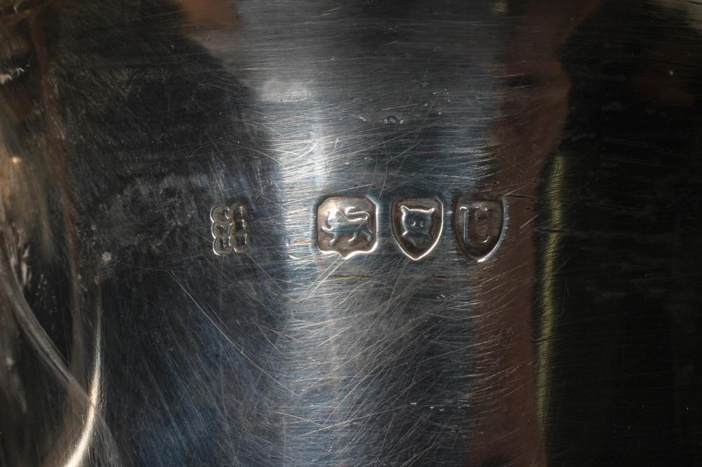 A LATE VICTORIAN SILVER TWO HANDLED PORRINGER AND STAND by Holland, Aldwinckle & Slater, London Image
