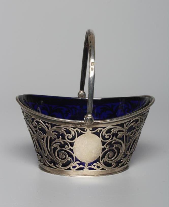AN EDWARDIAN SILVER SWEETMEAT BASKET by Joseph Rodgers & Sons Image