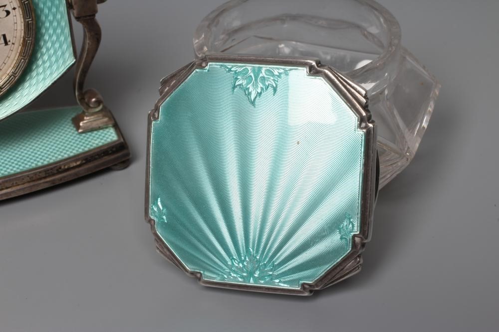 AN ART DECO SILVER DRESSING TABLE TIMEPIECE Image