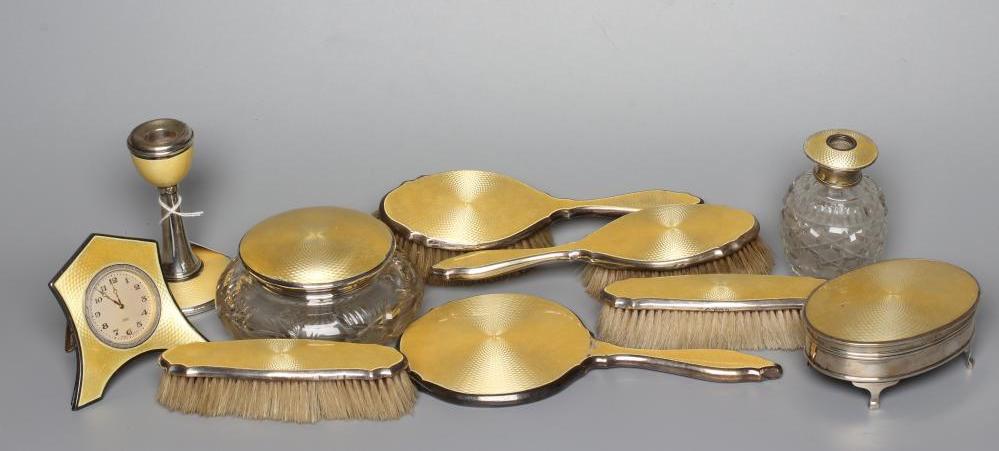 A MATCHED ART DECO SILVER TEN PIECE DRESSING TABLE SET Image