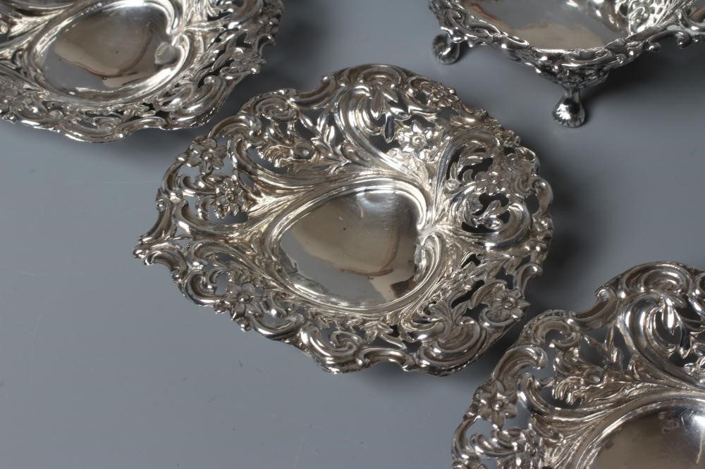 A SET OF FOUR LATE VICTORIAN SILVER BON-BON DISHES by Deakin & Francis Image