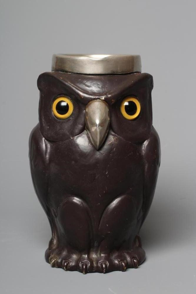 A LATE VICTORIAN DOULTON LAMBETH STONEWARE OWL ALE JUG Image
