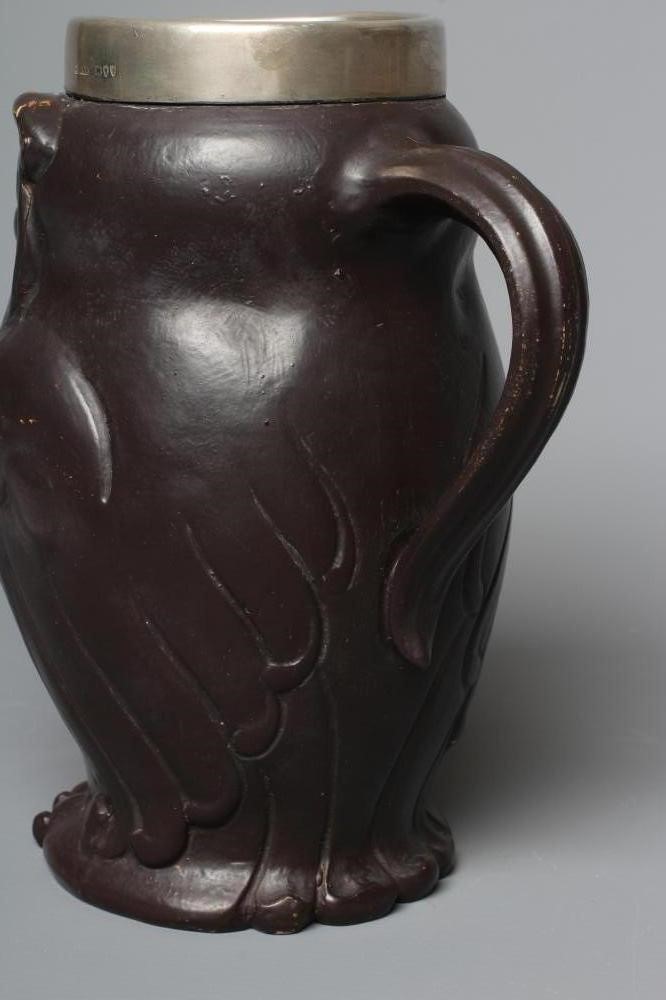 A LATE VICTORIAN DOULTON LAMBETH STONEWARE OWL ALE JUG Image