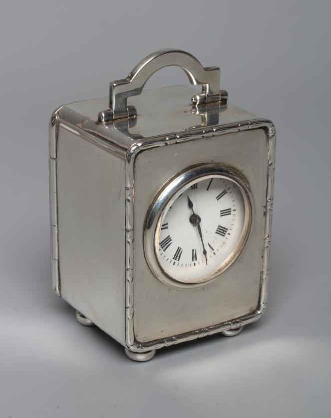 A GEORGE V SILVER BOUDOIR TIME PIECE by Asprey Image