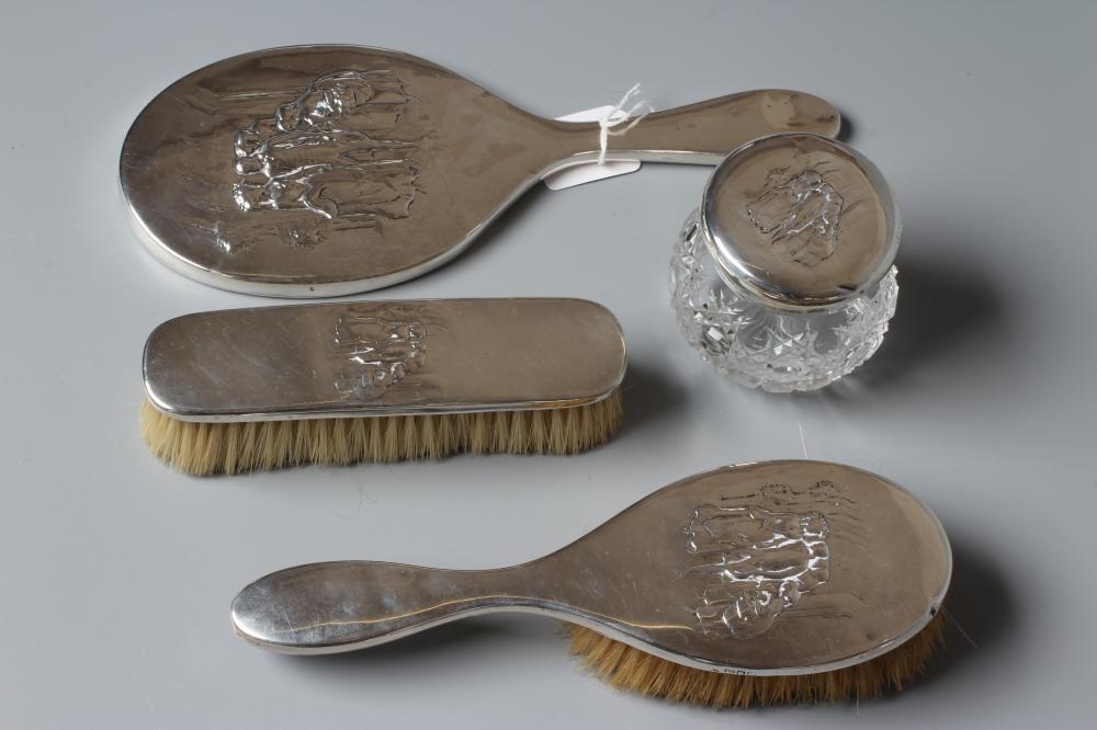 A COMPOSITE EDWARDIAN SILVER FOUR PIECE DRESSING TABLE SET by William Comyns Image
