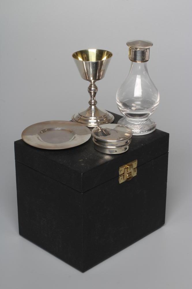 AN ELIZABETH II SILVER TRAVELLING COMMUNION SET by Henwood Decorative Metal Studios Image