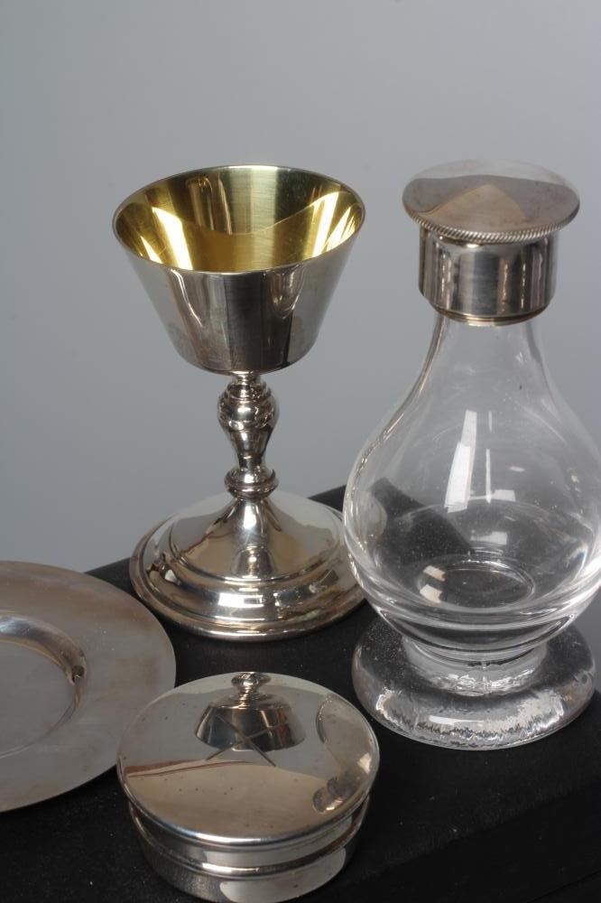 AN ELIZABETH II SILVER TRAVELLING COMMUNION SET by Henwood Decorative Metal Studios Image