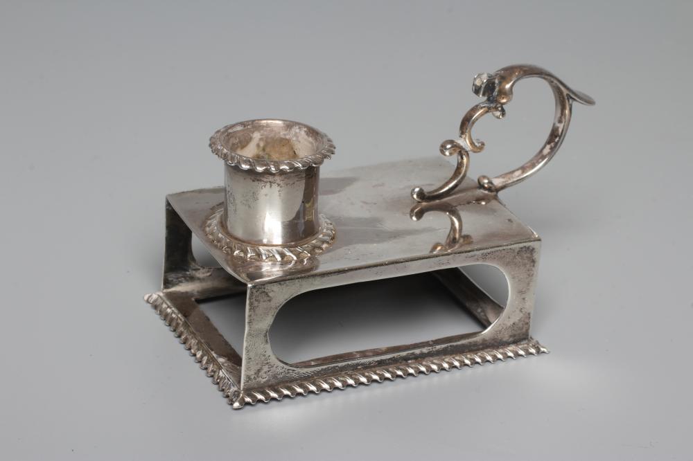 A LATE VICTORIAN SILVER 'GO TO BED' by George Unite, Birmingham 1898, the oblong base with gadrooned Image