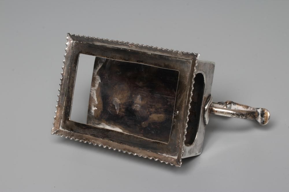 A LATE VICTORIAN SILVER 'GO TO BED' by George Unite, Birmingham 1898, the oblong base with gadrooned Image