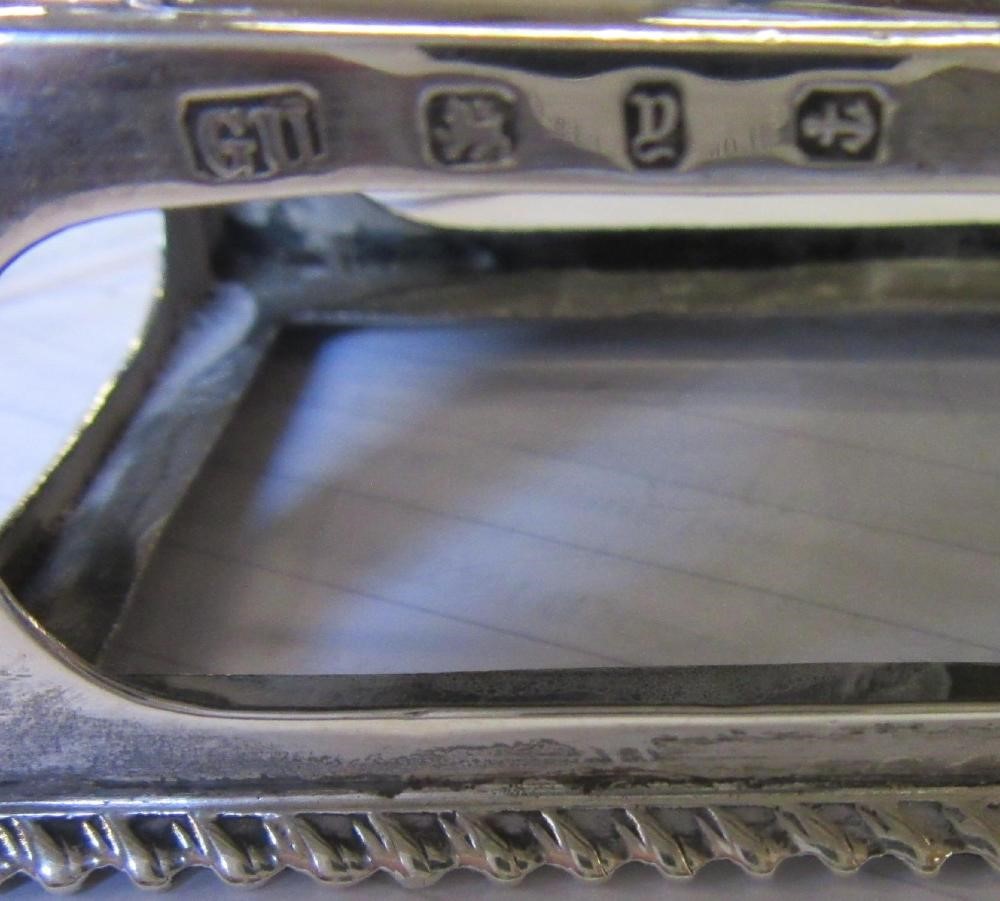 A LATE VICTORIAN SILVER 'GO TO BED' by George Unite, Birmingham 1898, the oblong base with gadrooned Image