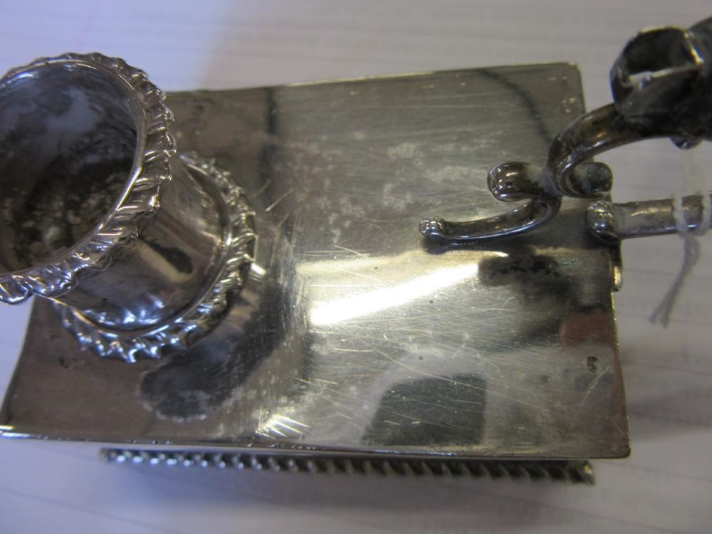A LATE VICTORIAN SILVER 'GO TO BED' by George Unite, Birmingham 1898, the oblong base with gadrooned Image