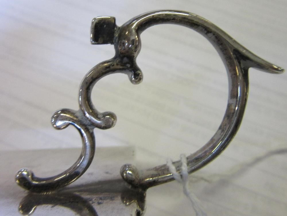 A LATE VICTORIAN SILVER 'GO TO BED' by George Unite, Birmingham 1898, the oblong base with gadrooned Image