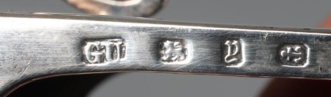 A LATE VICTORIAN SILVER 'GO TO BED' by George Unite, Birmingham 1898, the oblong base with gadrooned Image