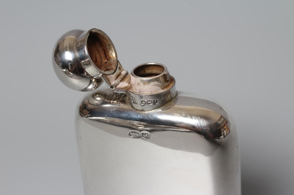 A GEORGE V SILVER HIP FLASK, maker's mark HNH & Co., Sheffield 1923, of plain rounded oblong form Image